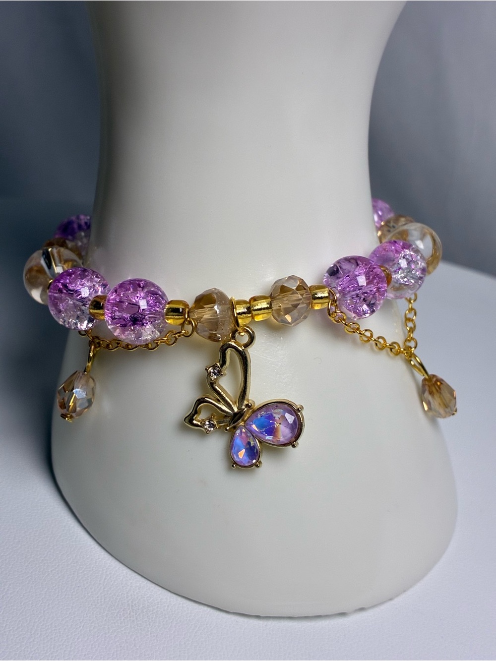 Gold Butterfly Charm Bracelet with Purple and Champagne Beads